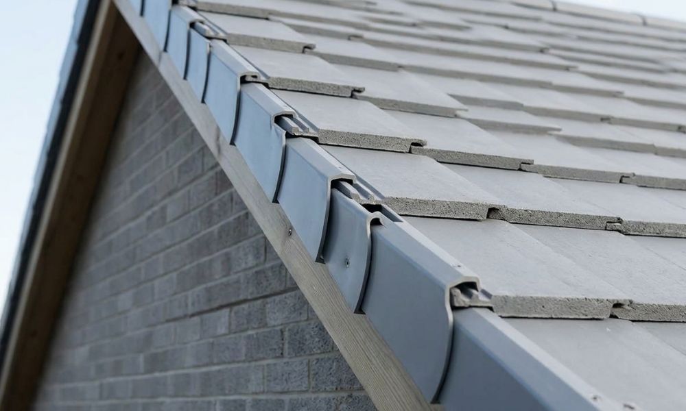 Before and after comparison of crumbling mortar verge replaced with dry verge caps in Stoke-on-Trent